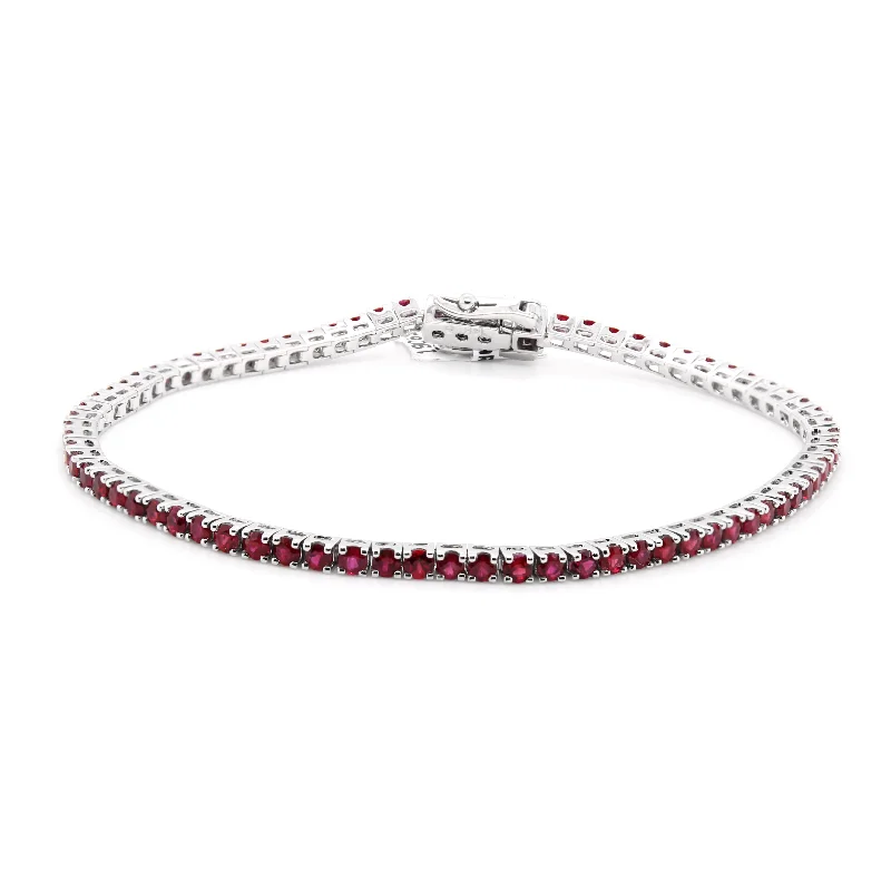 ladies-beaded-silver-bracelets-WHITE GOLD AND RUBY TENNIS BRACELET