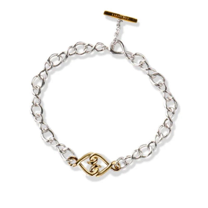 ladies-moon-gold-bracelets-STERLING SILVER BRACELET WITH GOLD INTERLOCKED HEART DESIGN