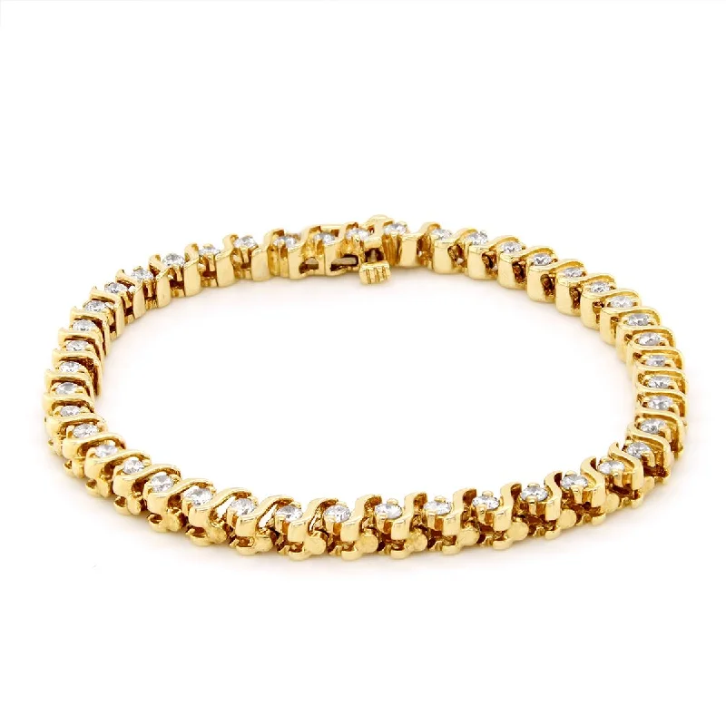 ladies-minimalist-diamond-bracelets-YELLOW GOLD TENNIS BRACELET WITH 43 ROUND DIAMONDS, 1 1/2 CT TW