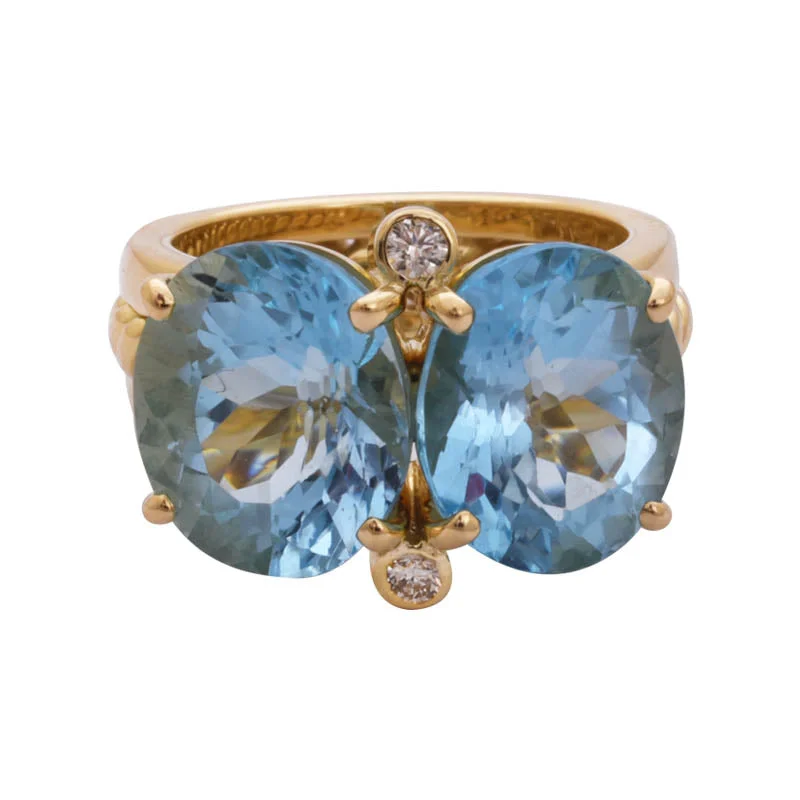 Ladies rings with cross designs -RING- BLUE TOPAZ AND DIAMOND IN 18K GOLD