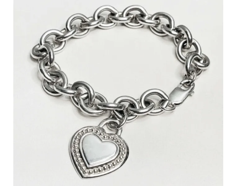 ladies-classic-diamond-bracelets-Judith Ripka Heart Tag Bracelet in Sterling Silver