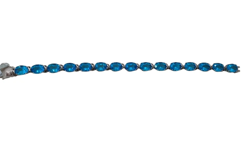 ladies-charm-diamond-bracelets-Sterling Silver Blue Topaz Bracelet